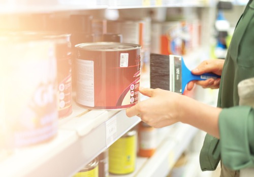 A customer looking for paint in a Hardware Store in Peoria IL